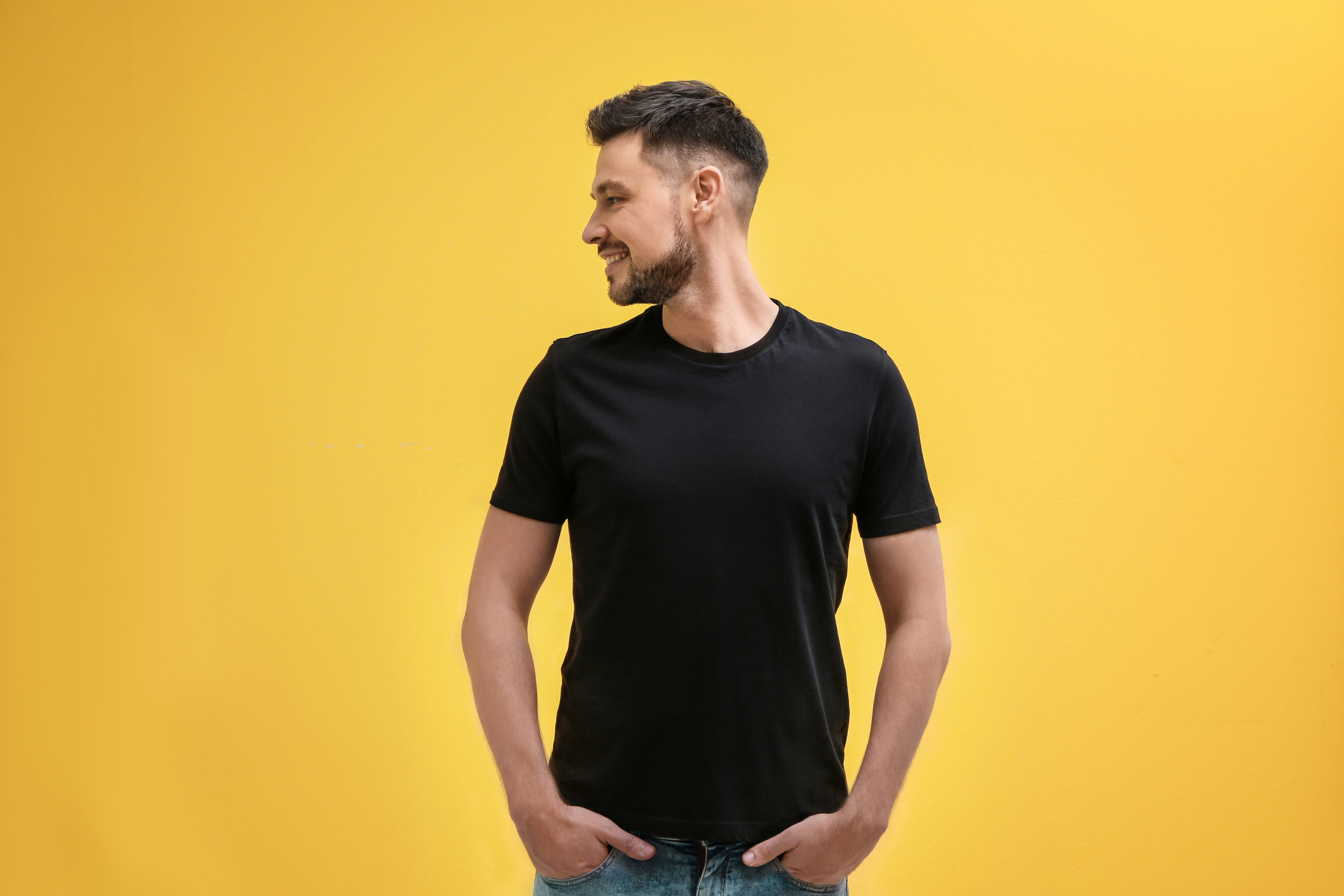 Man in Black Shirt on Yellow Background